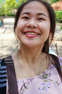 Portrait of a smiling young woman