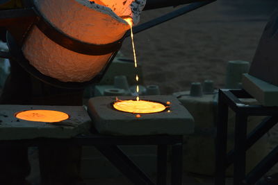 Close-up of illuminated lamps on table