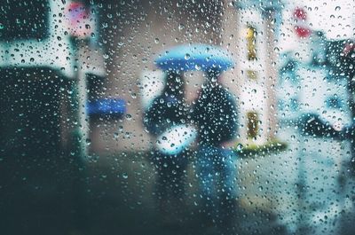 Full frame shot of water drops on glass window