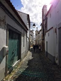 Narrow alley along buildings