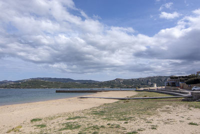 Scenic view of beach against sky in city