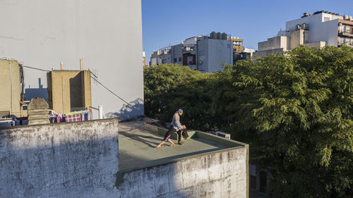 Couple dancing in a roof top in buenos aires 