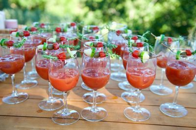 Close-up of wine glasses on table