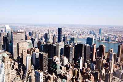 Aerial view of cityscape against clear sky