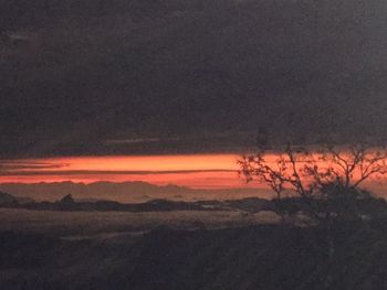 Scenic view of dramatic sky during sunset