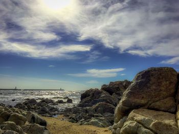 Scenic view of beach against sky