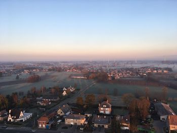 High angle view of townscape against sky at sunset