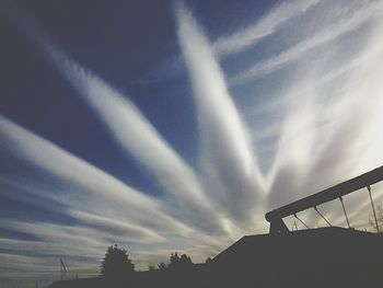 Low angle view of built structure against cloudy sky