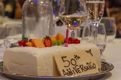 Cake with a writing dedicated to a couple's 50th wedding anniversary, venice, italy