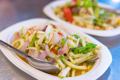 Close-up of pasta in plate on table