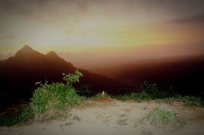 Scenic view of mountains against sky during sunset