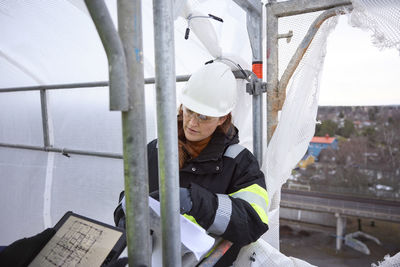 Female engineer at building site