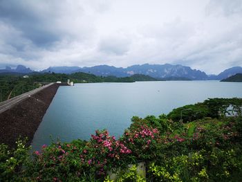 Scenic view of sea against cloudy sky