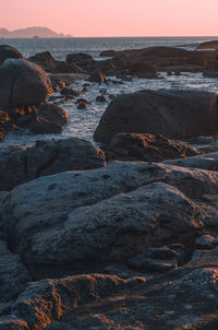 Scenic view of sea against clear sky during sunset