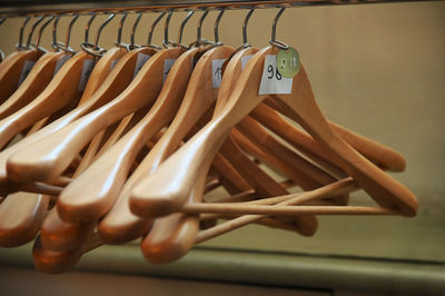 Close-up of clothes hanging on rack