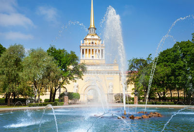 Fountain in front of historical building