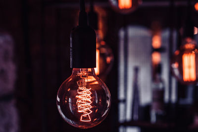 Close-up of illuminated light bulb