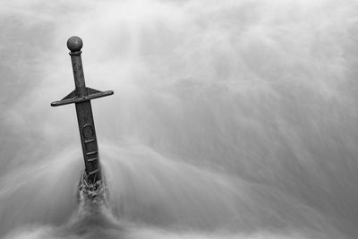 Close up of the sword in the stone in the cheddar yeo in cheddar in somerset.