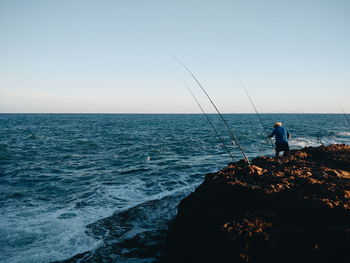 Scenic view of sea against clear sky