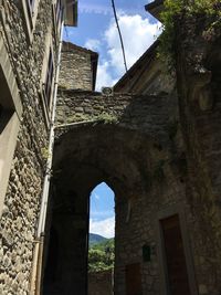 Low angle view of old building against sky