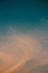 Low angle view of clouds in sky during sunset