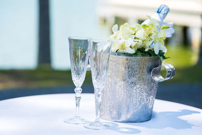 Close-up of white flower vase on table