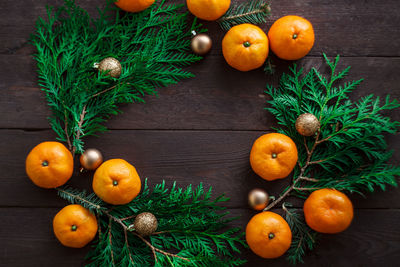 Orange fruits on wooden table