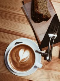 High angle view of cappuccino on table