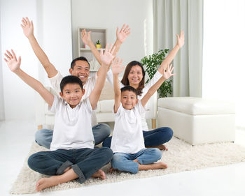 Portrait of happy family at home