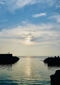 Scenic view of sea against sky during sunset