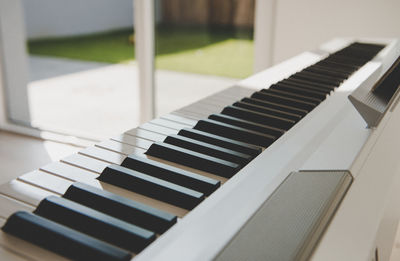 Close-up of piano keys at home