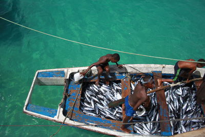 High angle view of men in boat