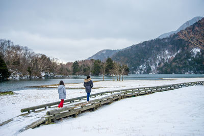 Scenic view of snow covered mountains