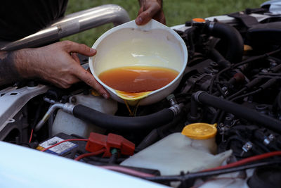 At home oil change for a suburu working on a car