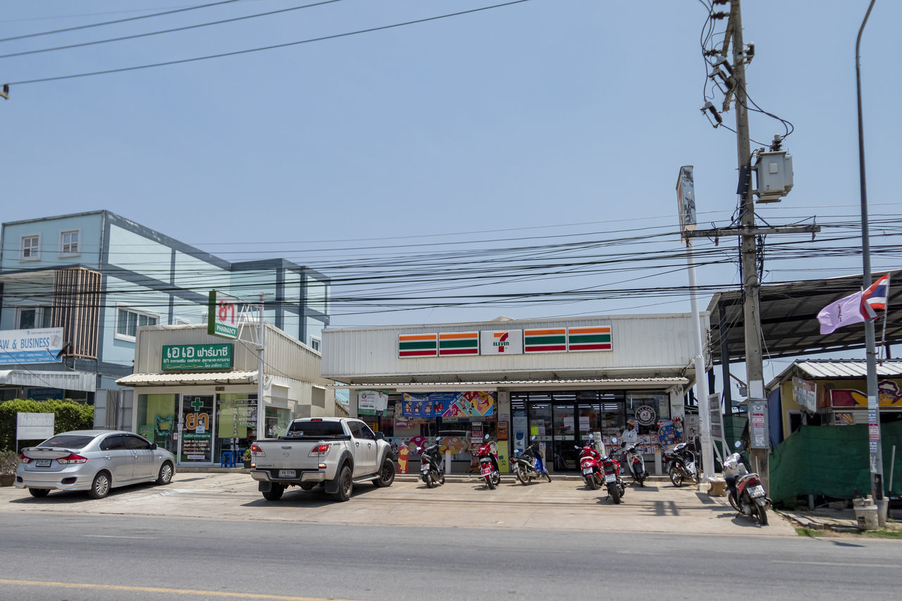 CARS ON ROAD IN CITY