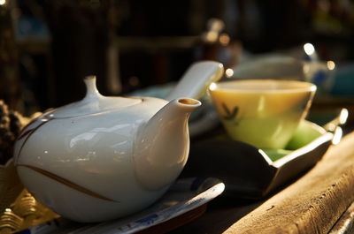 Close-up of tea cup on table