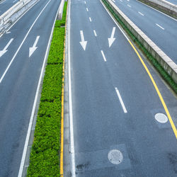 Arrow symbol on road in city