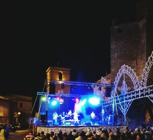 Fountain in front of ferris wheel