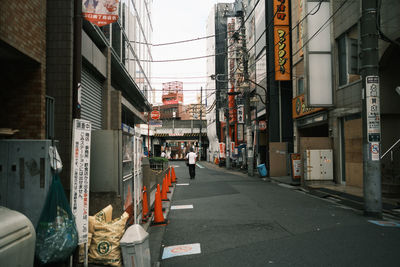 Street amidst buildings in city