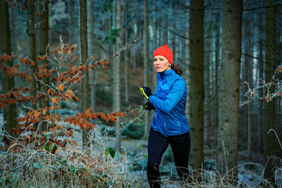 Woman hiking in forest