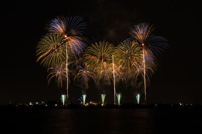 Firework display at night