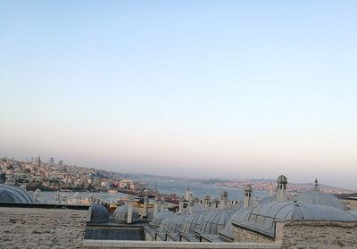 View of cityscape against clear sky