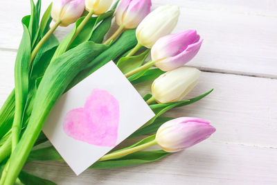 Close-up of pink tulip flowers on table