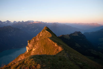 Scenic view of mountains against sky during sunset