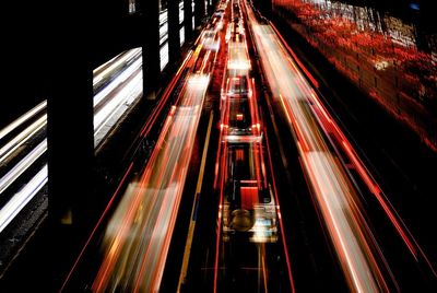 High angle view of light trails on city at night