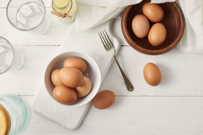 Directly above shot of eggs in bowl on table