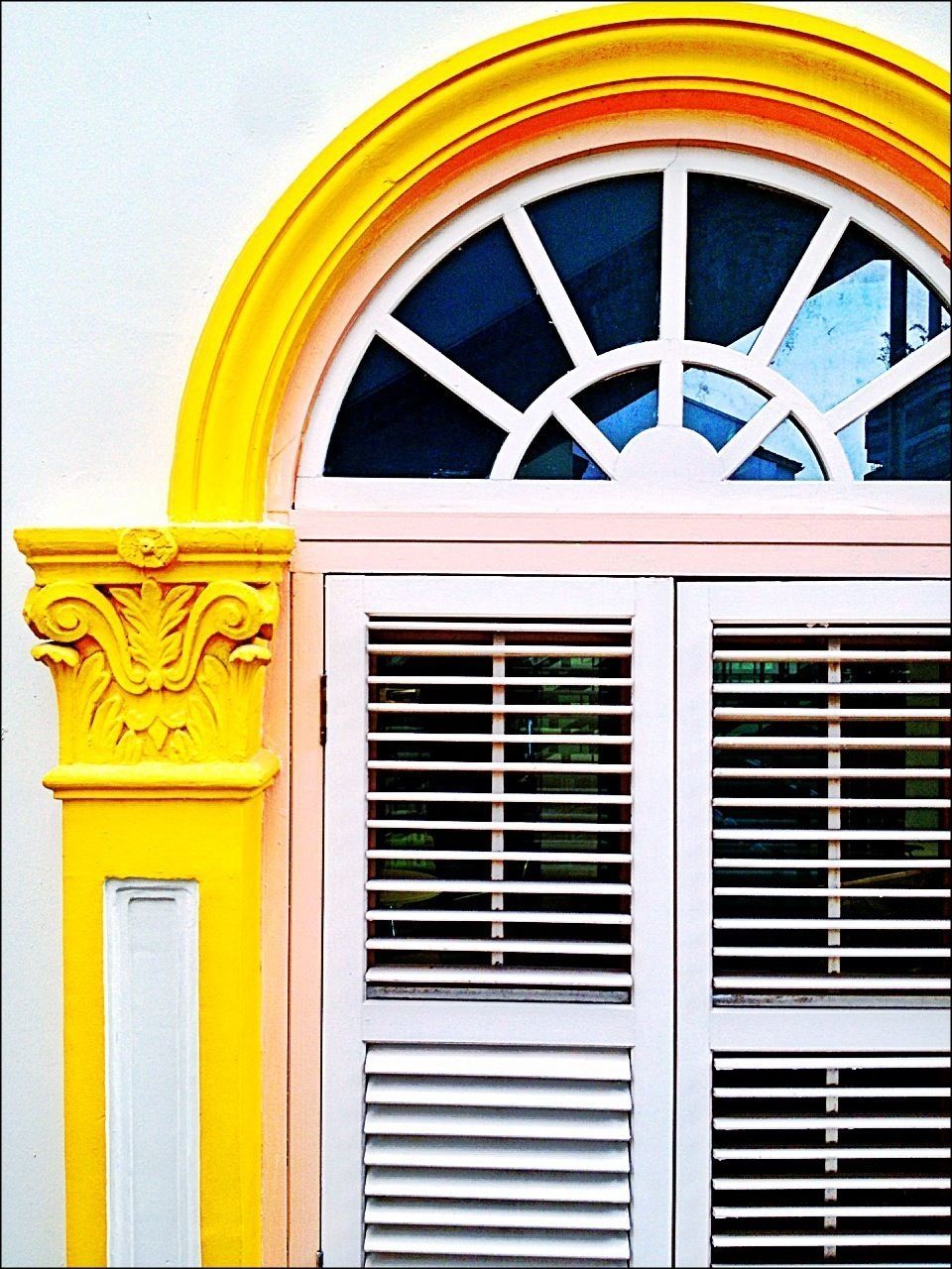 architecture, built structure, building exterior, yellow, arch, window, door, low angle view, closed, facade, entrance, ornate, pattern, building, no people, day, design, outdoors, glass - material, circle