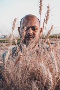 Portrait of man on field