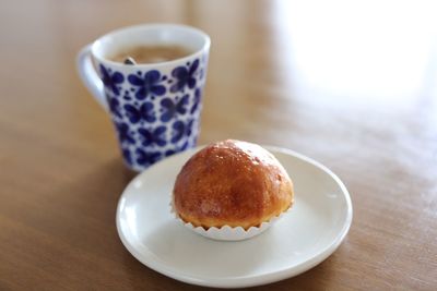 Close-up of food and coffee cup on table