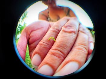 Close-up of hand holding ice cream